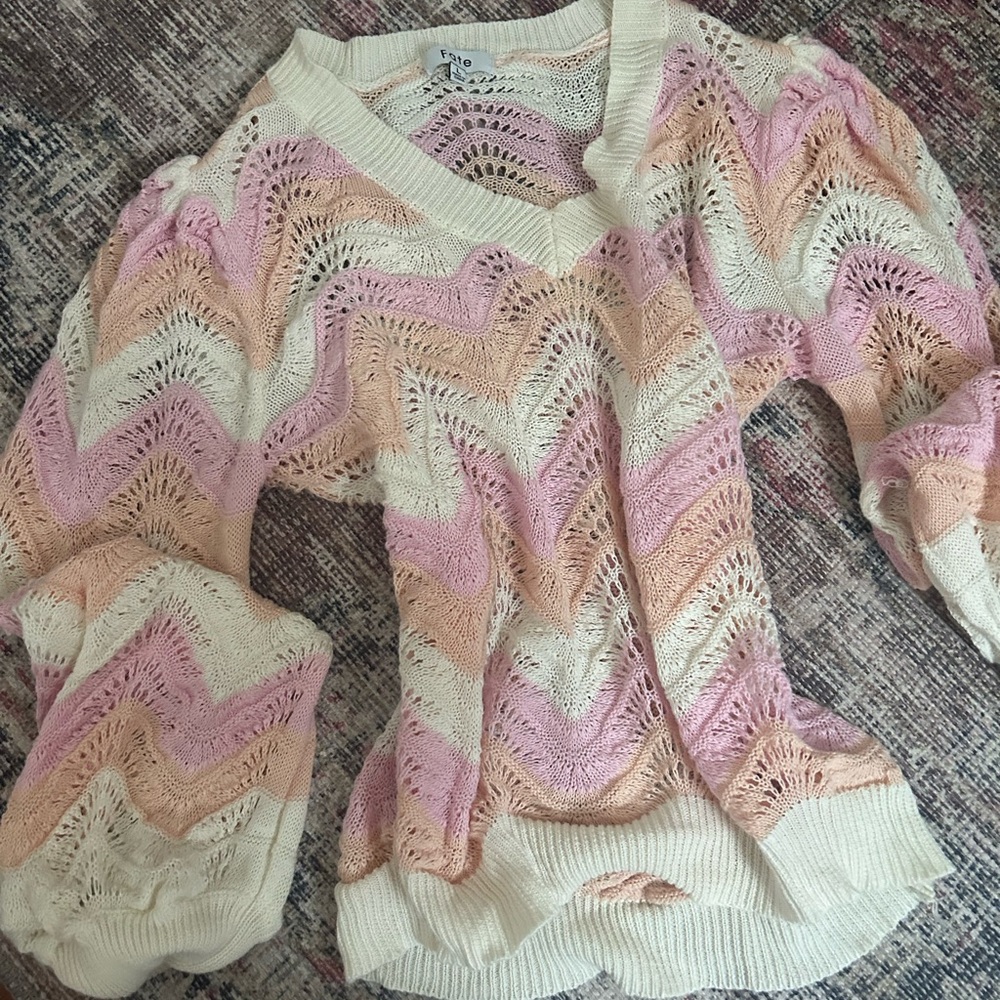 Pink and white sweater with baggy sleeves